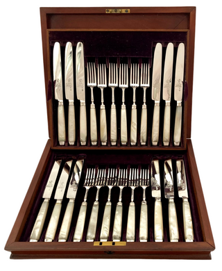 George III Cased Set of Crested Silver & Mother of Pearl Dessert Knives & Forks for Twelve, circa 1810.
