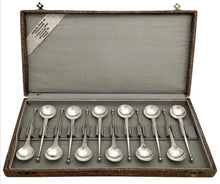 Twelve Dutch Silver Dessert Spoons. M. Bijkamp of Steenwijk. 3.8 troy ounces.