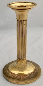 Early 19th Century Set of Four Gilded Old Sheffield Plate Candlesticks.
