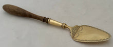 French Provincial Silver Gilt Butter Spade. Imlin of Strasbourg, 18th Century.