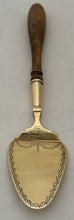 French Provincial Silver Gilt Butter Spade. Imlin of Strasbourg, 18th Century.