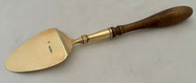 French Provincial Silver Gilt Butter Spade. Imlin of Strasbourg, 18th Century.