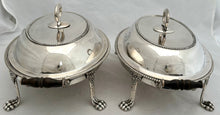 George III Pair of Old Sheffield Plate Entree Dishes on Lion Paw Feet Stands, circa 1810.