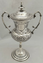 Late Victorian Silver Plated Trophy Cup & Cover with Four Vacant Cartouches.