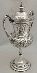 Late Victorian Silver Plated Trophy Cup & Cover with Four Vacant Cartouches.