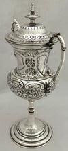 Late Victorian Silver Plated Trophy Cup & Cover with Four Vacant Cartouches.