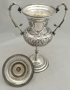 Late Victorian Silver Plated Trophy Cup & Cover with Four Vacant Cartouches.