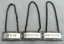 George V Whisky, Brandy & Rum Silver Decanter Labels. London 1933 D & J Wellby Ltd.