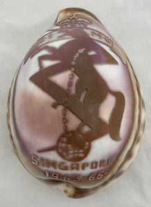 Engraved Cowrie Shell with Insignia of the Royal Electrical & Mechanical Engineers.