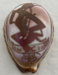 Engraved Cowrie Shell with Insignia of the Royal Electrical & Mechanical Engineers.