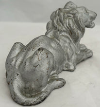 19th Century Silvered Cast Iron Recumbent Lion.