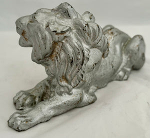 19th Century Silvered Cast Iron Recumbent Lion.