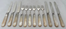 George IV Silver and Carved Mother of Pearl Dessert Knives & Forks for Twelve. Sheffield 1824 - 29, Aaron Hadfield.