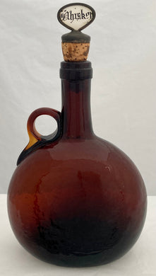 Late Georgian Brown Glass Flagon Decanter with Mother of Pearl Whiskey Stopper, circa 1830.