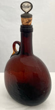 Late Georgian Brown Glass Flagon Decanter with Mother of Pearl Whiskey Stopper, circa 1830.