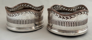 Pair of 19th Century Silver Plate on Copper Bottle Coasters.