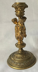 Victorian Gilt Brass Neoclassical Candlestick Adorned with Putti.