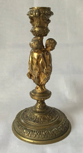 Victorian Gilt Brass Neoclassical Candlestick Adorned with Putti.