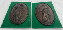 Pair of 19th Century Neoclassical Bronze Oval Relief Plaques with Ribbon & Reeded Borders.