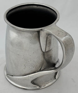 Arts & Crafts Pewter Tankard, circa 1900. After Oliver Baker.