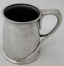 Arts & Crafts Pewter Tankard, circa 1900. After Oliver Baker.