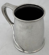 Arts & Crafts Pewter Tankard, circa 1900. After Oliver Baker.