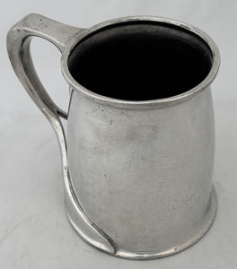 Arts & Crafts Pewter Tankard, circa 1900. After Oliver Baker.