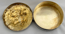 Continental White Metal Putti Relief Snuff Box with Gilded Interior. 1.9 troy ounces.