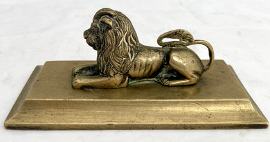 A Regency Period Desk Weight, Cast as a Recumbent Lion, circa 1820.