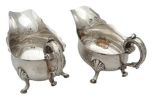 George III Pair of Old Sheffield Plate Crested Sauce Boats, circa 1780 - 1810.