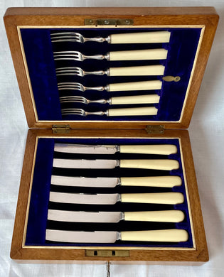 Oak Cased Dessert Knives & Forks for Six People. Cooper Brothers of Sheffield, circa 1900 - 1940.