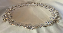 Large 17 Inch Ornate Silver Plated Salver with Raised Shell & Scroll Border.