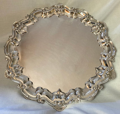 Large 17 Inch Ornate Silver Plated Salver with Raised Shell & Scroll Border.