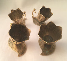 Victorian cased set of four novelty gilt metal salts and spoons, in the form of flowers and leaves.