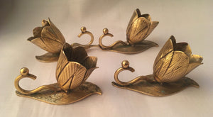 Victorian cased set of four novelty gilt metal salts and spoons, in the form of flowers and leaves.