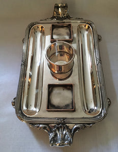 Late Georgian Sheffield Plated twin inkstand with central taper stick holder.