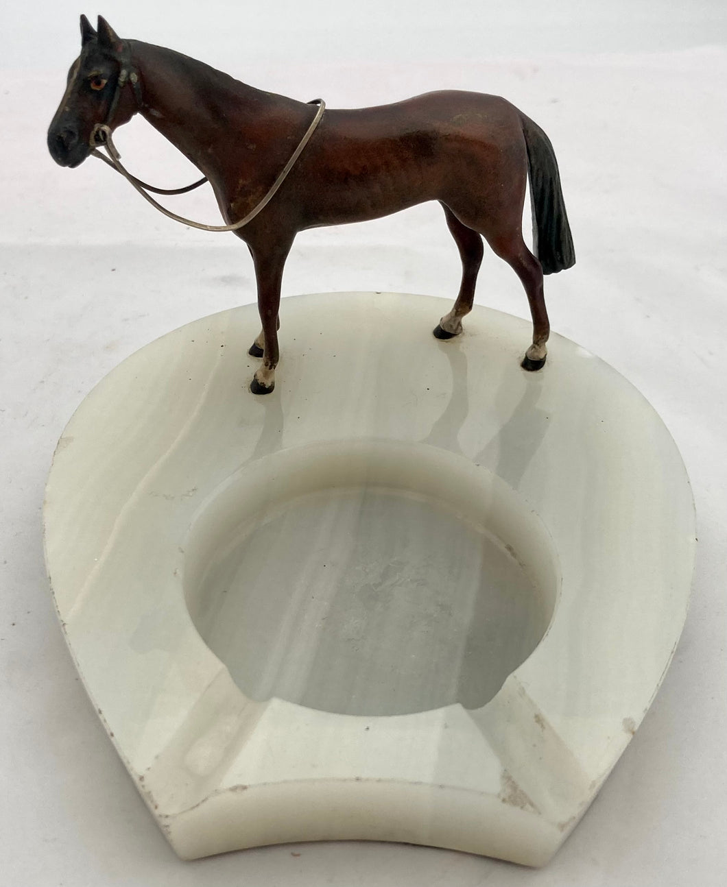 Asprey Cold Painted Bronze Horse Mounted on an Onyx Base.