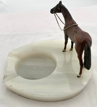 Asprey Cold Painted Bronze Horse Mounted on an Onyx Base.