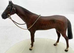 Asprey Cold Painted Bronze Horse Mounted on an Onyx Base.