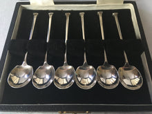 Elizabeth II cased set of six silver seal top coffee spoons. Sheffield 1954/55 James Dixon & Sons Ltd.  1.38 troy ounces.