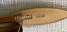 Asprey 9 carat gold cased page marker. London 1929 Asprey & Co. Ltd. 7.3 grams.