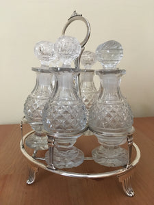 Georgian, George III, silver cruet stand with six cut glass bottles. London 1807 John Emes.