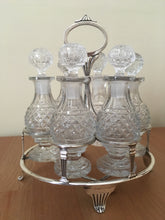 Georgian, George III, silver cruet stand with six cut glass bottles. London 1807 John Emes.