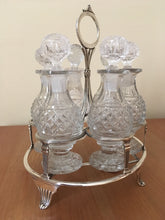 Georgian, George III, silver cruet stand with six cut glass bottles. London 1807 John Emes.