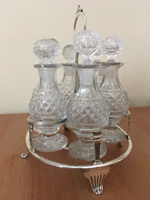 Georgian, George III, silver cruet stand with six cut glass bottles. London 1807 John Emes.