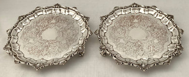 Pair of Silver Plate on Copper Waiters with Shell & Scroll Borders.