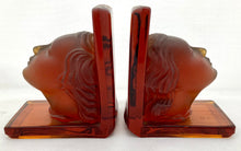 Pair of Art Deco Amber Glass Bookends Depicting Maiden's Heads.