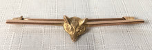 Hunting interest, 9 carat gold fox head brooch with safety chain.