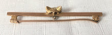 Hunting interest, 9 carat gold fox head brooch with safety chain.