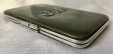 Victorian silver framed green leather card case with monogram. London 1888 Drew & Sons.